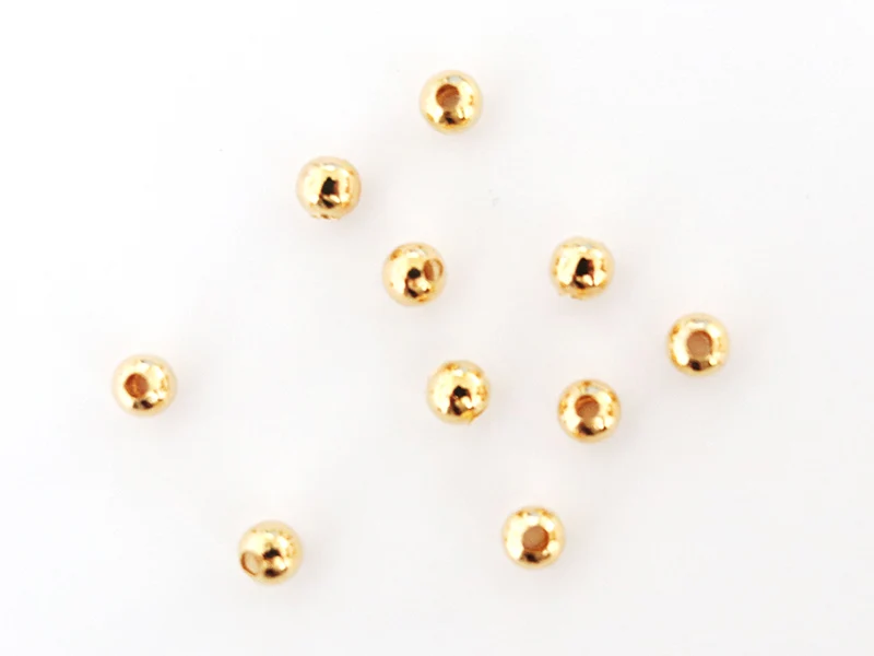 Lot de 50 perles rondes 4mm - dorées à l'or fin